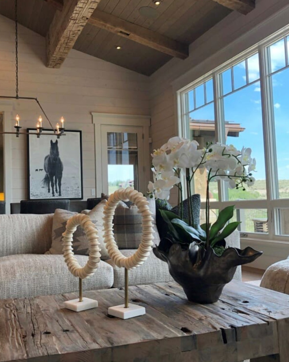 Dining table with orchid and art